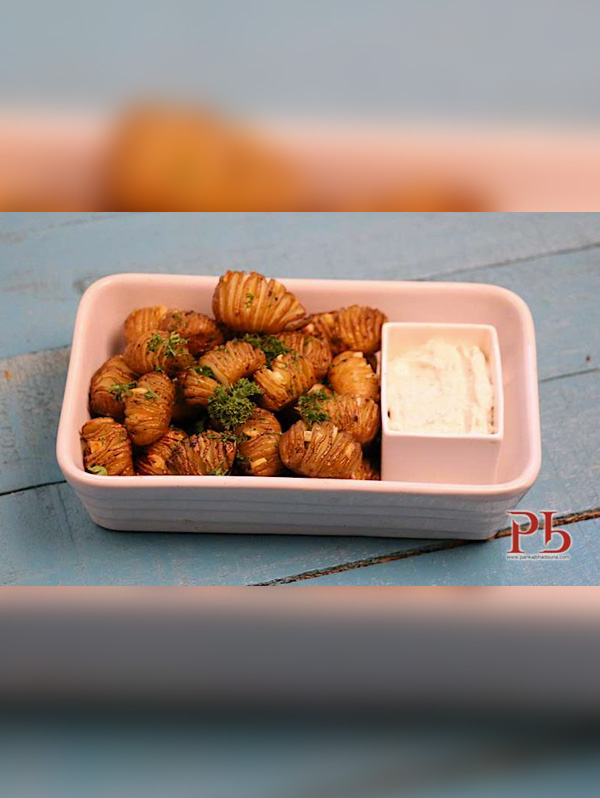Hasselback Baby Potatoes with Herbed Sour Cream Image